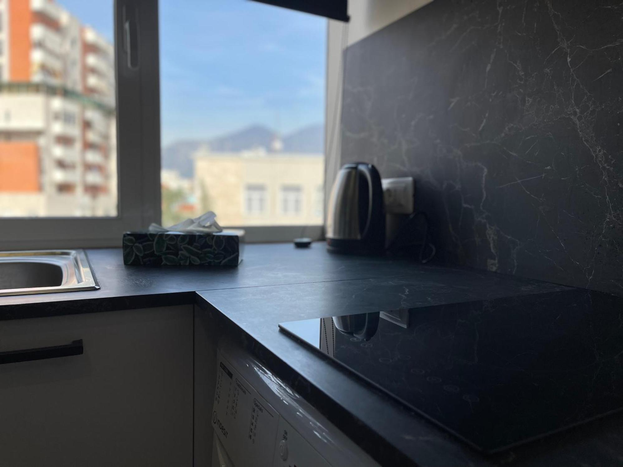 Boutique Central Studio Apartments Тирана Экстерьер фото